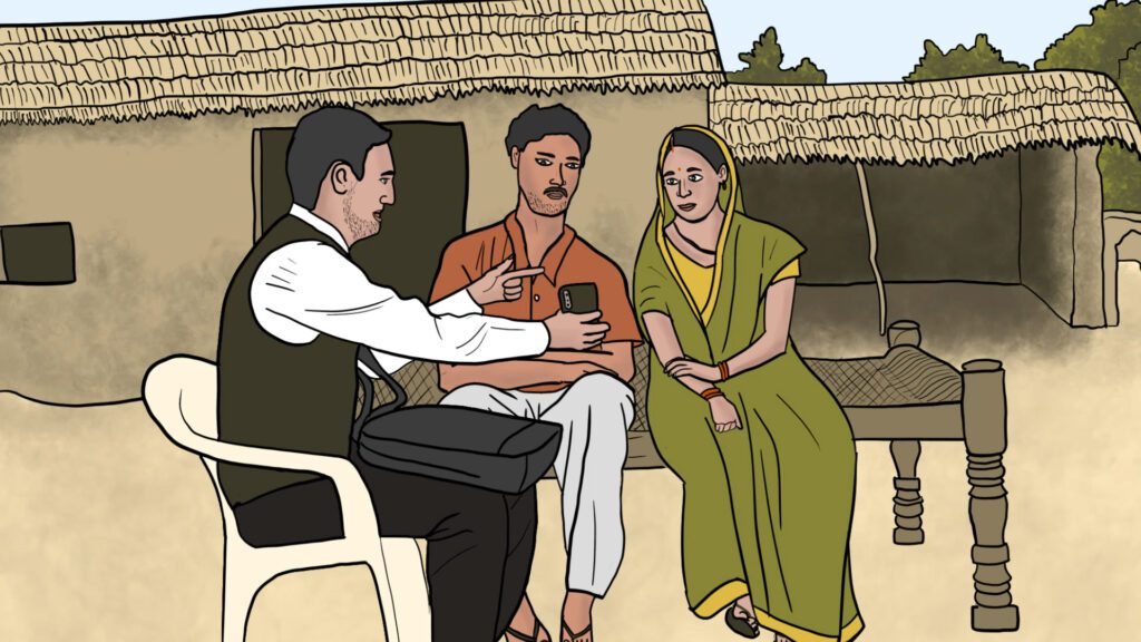 A Resham Doot, explaining to rural communities about the Gram Sootra App.